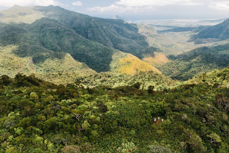 Aerial view of mountains and fields in Mauritius island.